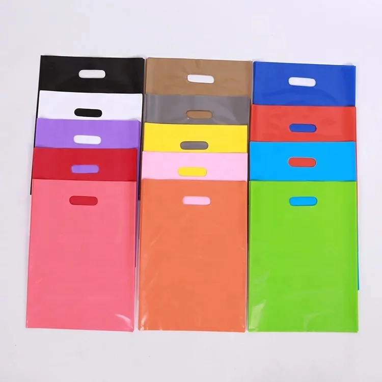 Wholesale can be customized logo printing standard size heavy color plastic shopping bag with handle