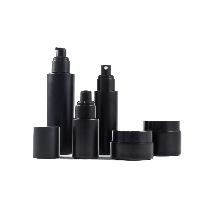 Custom cosmetics containers and packaging set lotion pump bottle cream jar spray matte black glass bottle