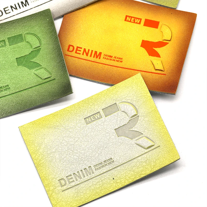 Wholesale Stylish Gradient Effect Washable Leather Patches With Design Metal Buckle Debossed Writing Men Jeans Leather Labels