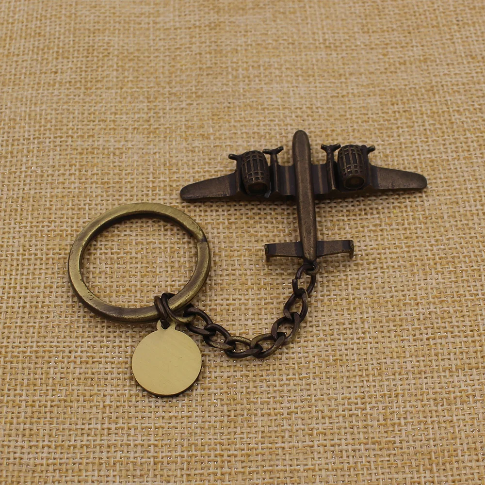 Custom made creative three-dimensional aircraft model batch key chain plane travel blank key chain