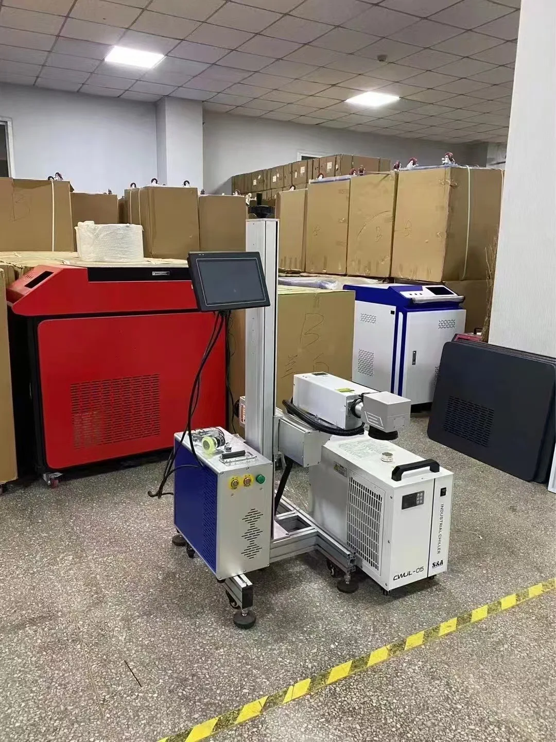 Best price co2 flying laser marking machine from China Industrial Laser printing machine