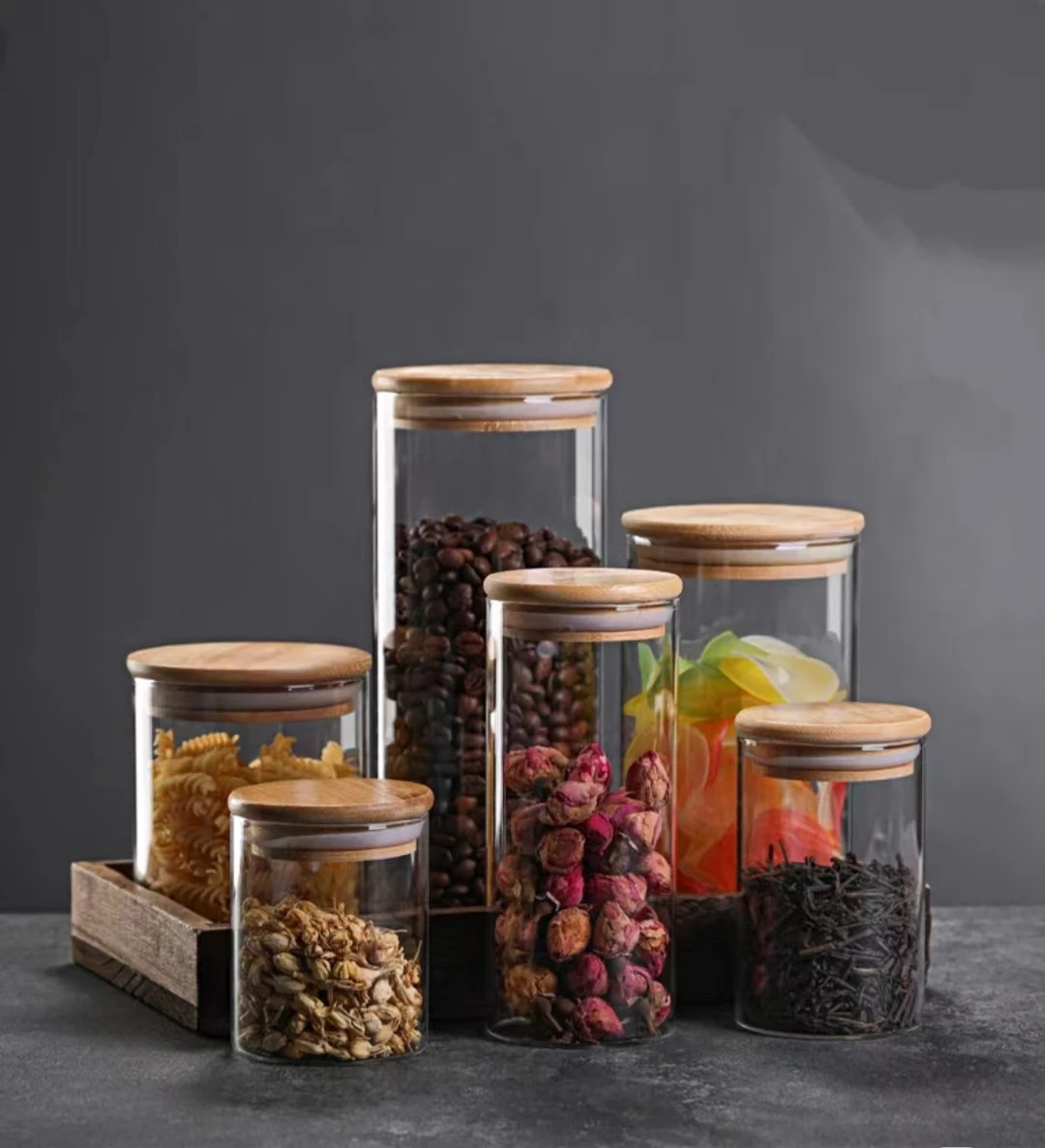 hot sell heat resistant high borosilicate kitchen containers cylinder glass sealed food cereal storage jar with bamboo lid