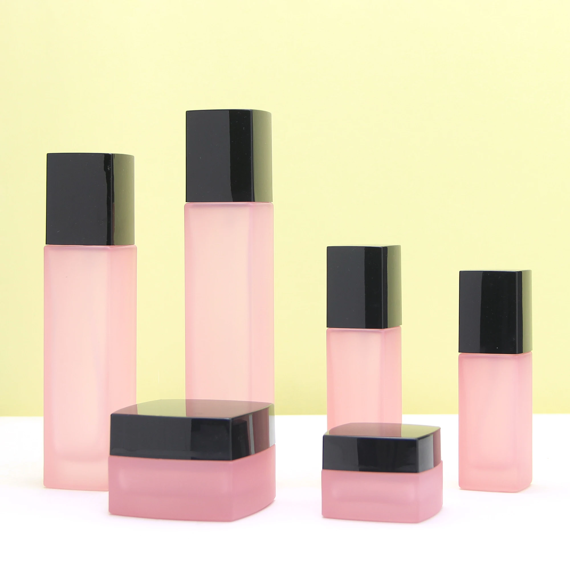 Wholesale cosmetic packaging set square matte pink empty body oil serum pump bottle and glass jars with lids