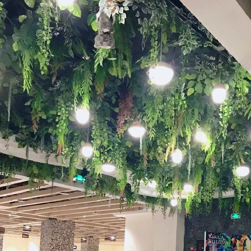 Wholesale Plastic Plant Faux Fern Leaf Garland Greenery indoor outdoor Ceiling Decor Artificial Grass Wall Hanging Plants