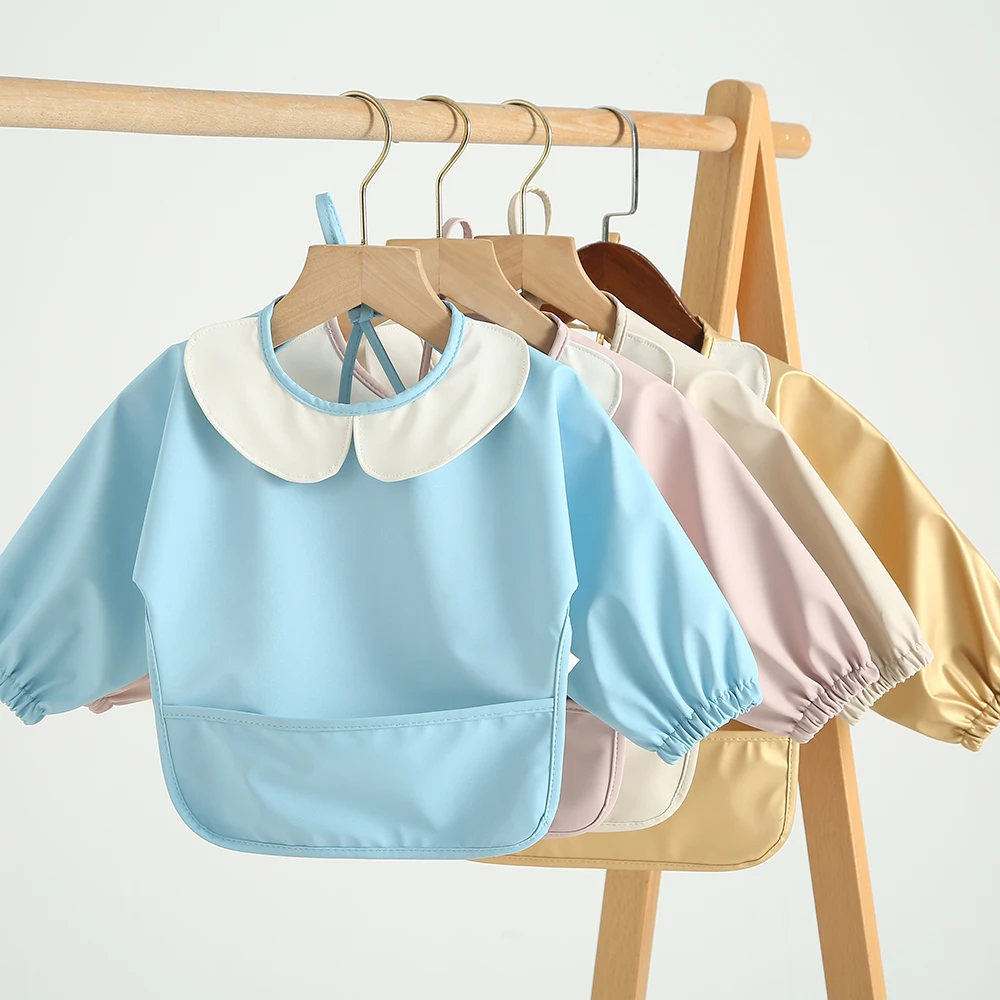 Long Sleeved Bib Children Smocked Clothing Washable Baby Apron OEM Service 100% Polyester Natucare BSCI Hot Selling Baby
