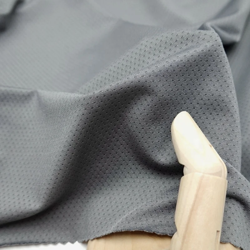 Quick dry 97/3 polyester spandex solid knit custom eyelet mesh jersey sports wear fabric for tshirts