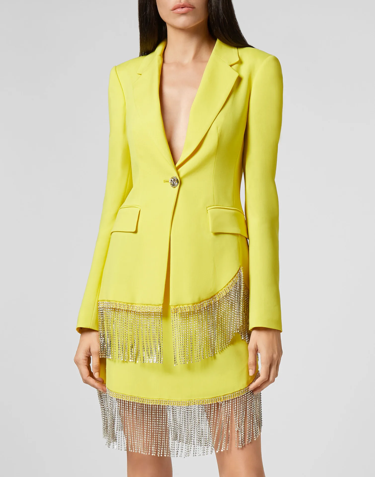 Женский костюм из двух предметов с кисточками