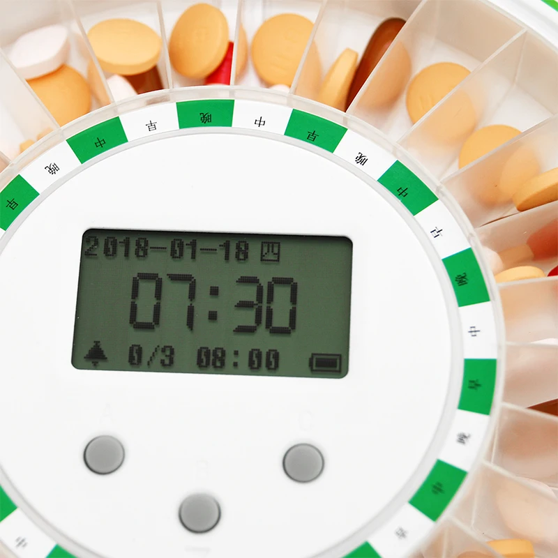 Plastic slide pill dispenser with voice alarm 28 compartment for elderly