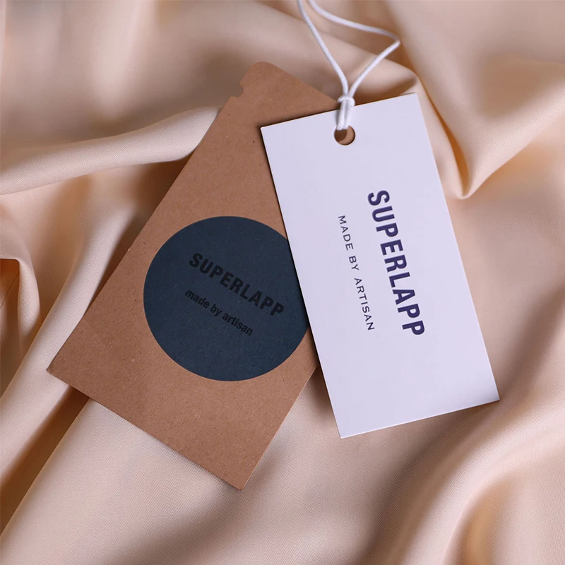 Wholesale Luxury Custom Logo Embossed Clothing Hang Tag Thick Paper Garment Hang Tag White Garment Tags And Labels