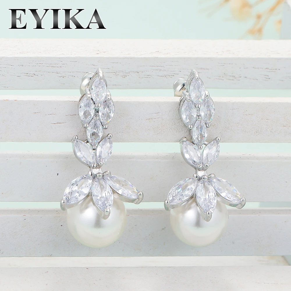 Wholesale womens elegant shell pearl platinum plated brass white zircon wedding engagement earrings jewelry