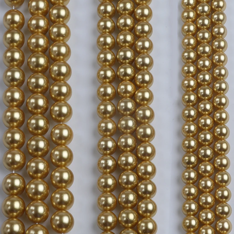 10-14mm big size wholesale high quality gold mother of pearl shell round pearl strand