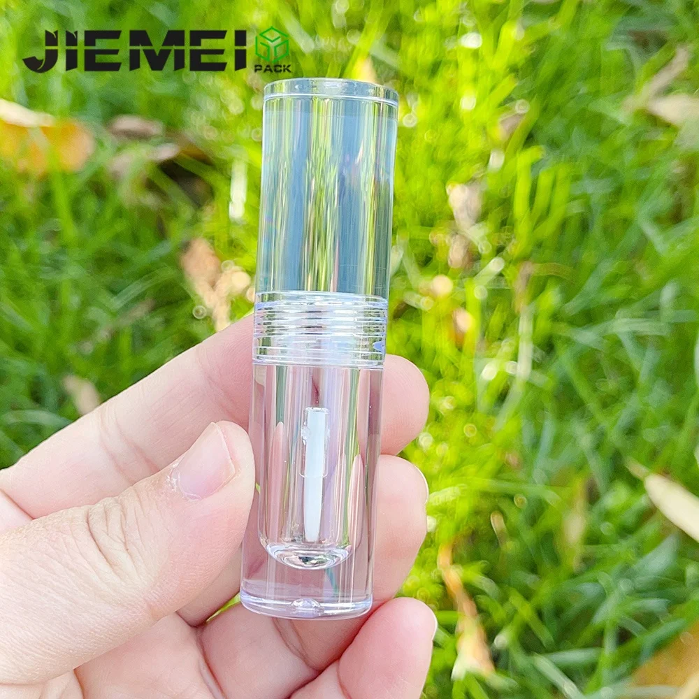 JIE MEI Stock High Quality 2ML Clear PET Lip Tint Wand Tube Wholesale Makeup Lip Gloss Bottle Lip Glaze Container With Brush