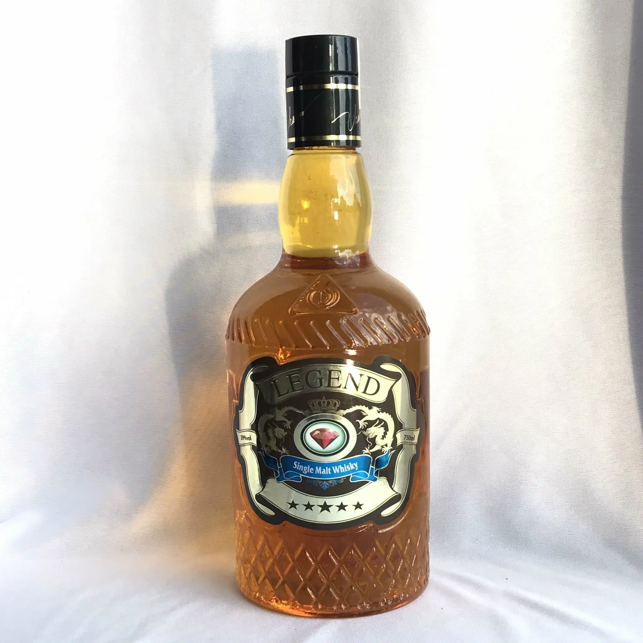 Legend Diamond Whisky Bottle With Alcoholic Beverage Grains And Herbs