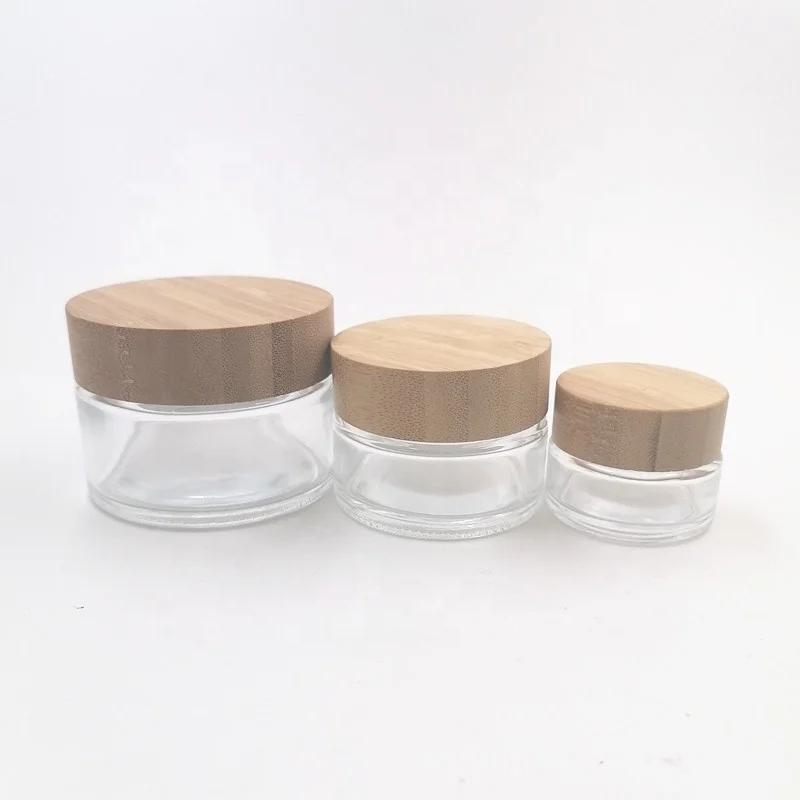 round high quality 30g 50g 100 g cosmetic lotion moisturiser glass jar ody scrub bottle with bamboo cap no plastic inside