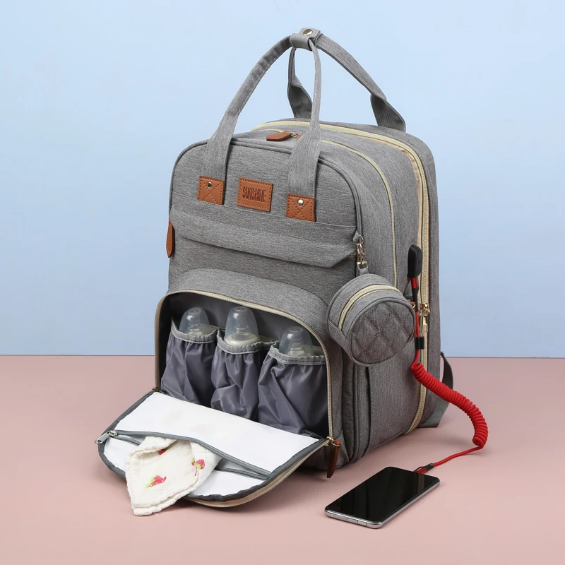 Amazon Hot Selling Fashion Mom Nappy Bag Waterproof Travel Backpack Multifunctional Crib Diaper Bag With Mosquito Net