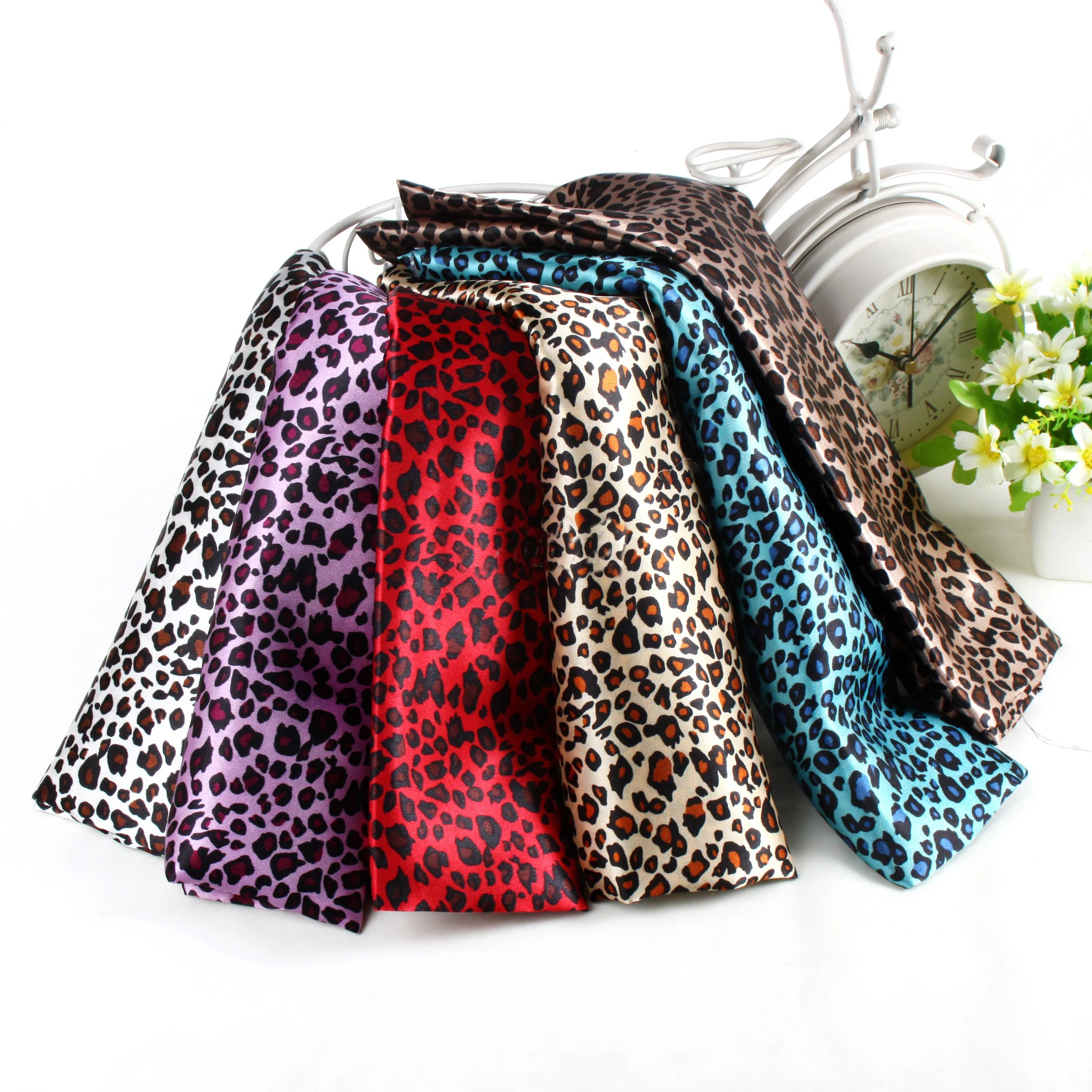 Factory cheap price 100% polyester shiny leopard satin material
