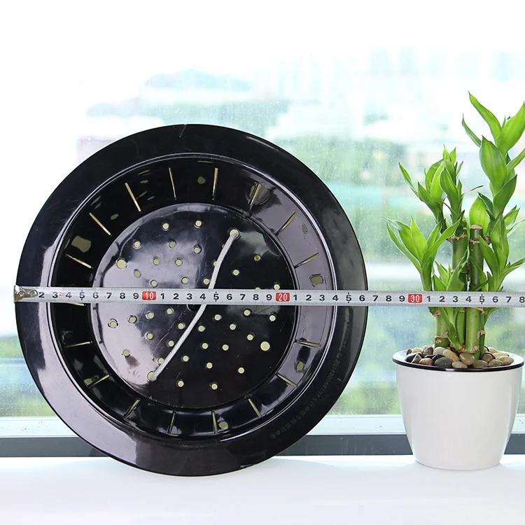 Self watering plastic flower plant pot for indoor