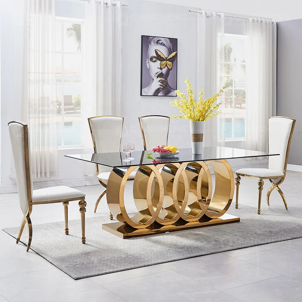 Wholesale foshan supplier furniture luxury modern big dianing table and 10 chairs set metal legs stainless steel dining table