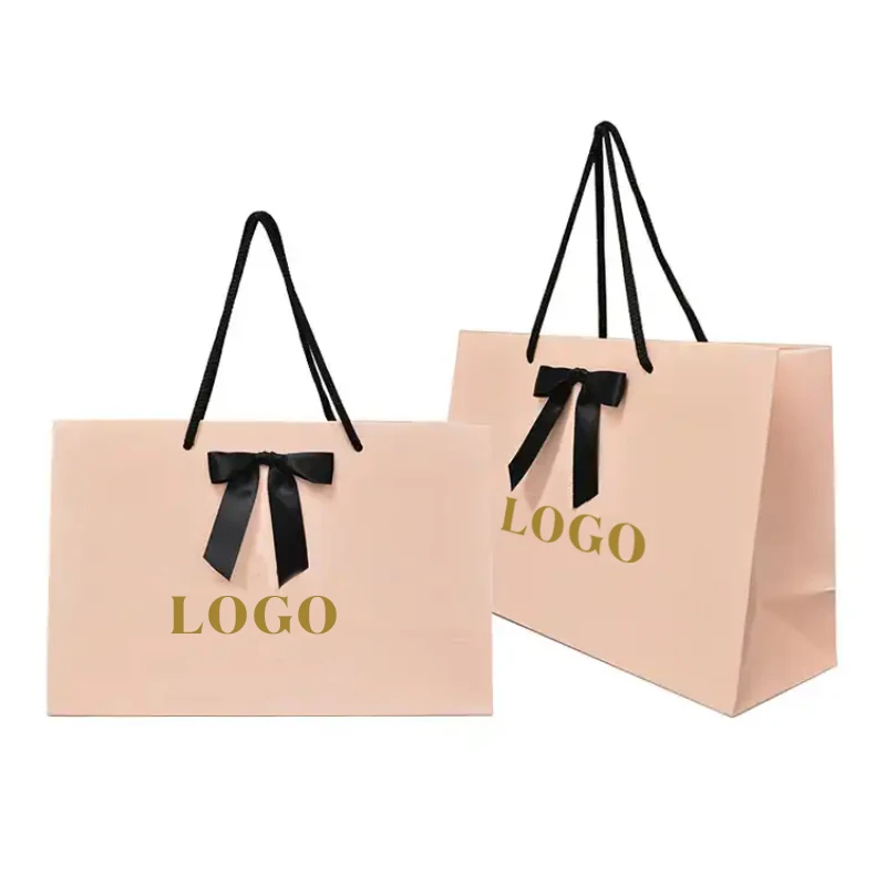 Factory wholesale custom printed brand logo bow tie design promotion luxury clothing gift shopping paper bag with handle
