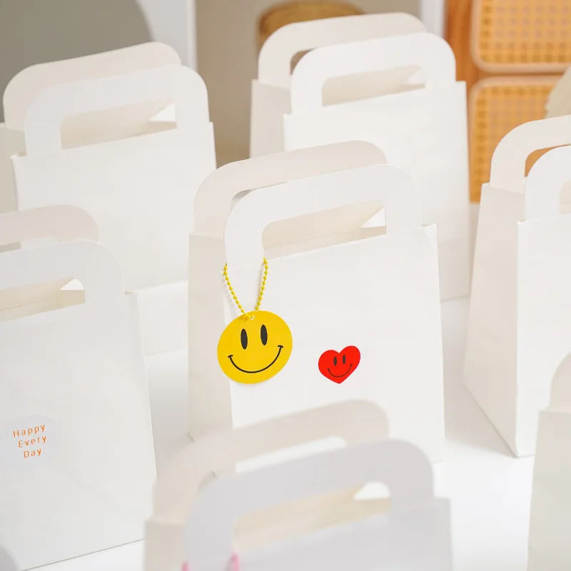 Factory Wholesale Paper Sweet Packaging Bags Custom Small White Kraft Paper Bag with Diecut Handle