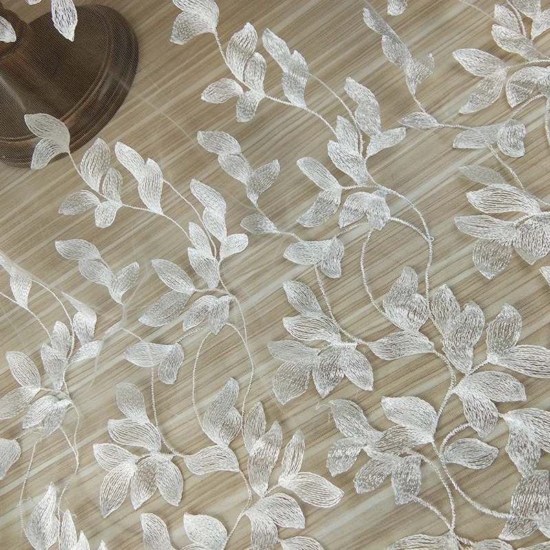 The latest embroidery tulle leaves lace fabric for dress