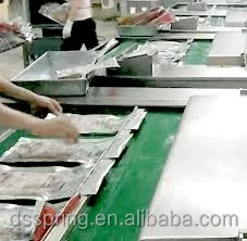 Машина для непрерывной вакуумной упаковки пищевых