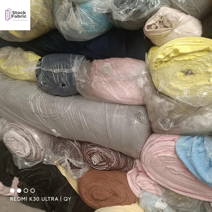 Hot selling 100% polyester flannel mixed colors solid stocklot fabric in Shaoxing textile in China