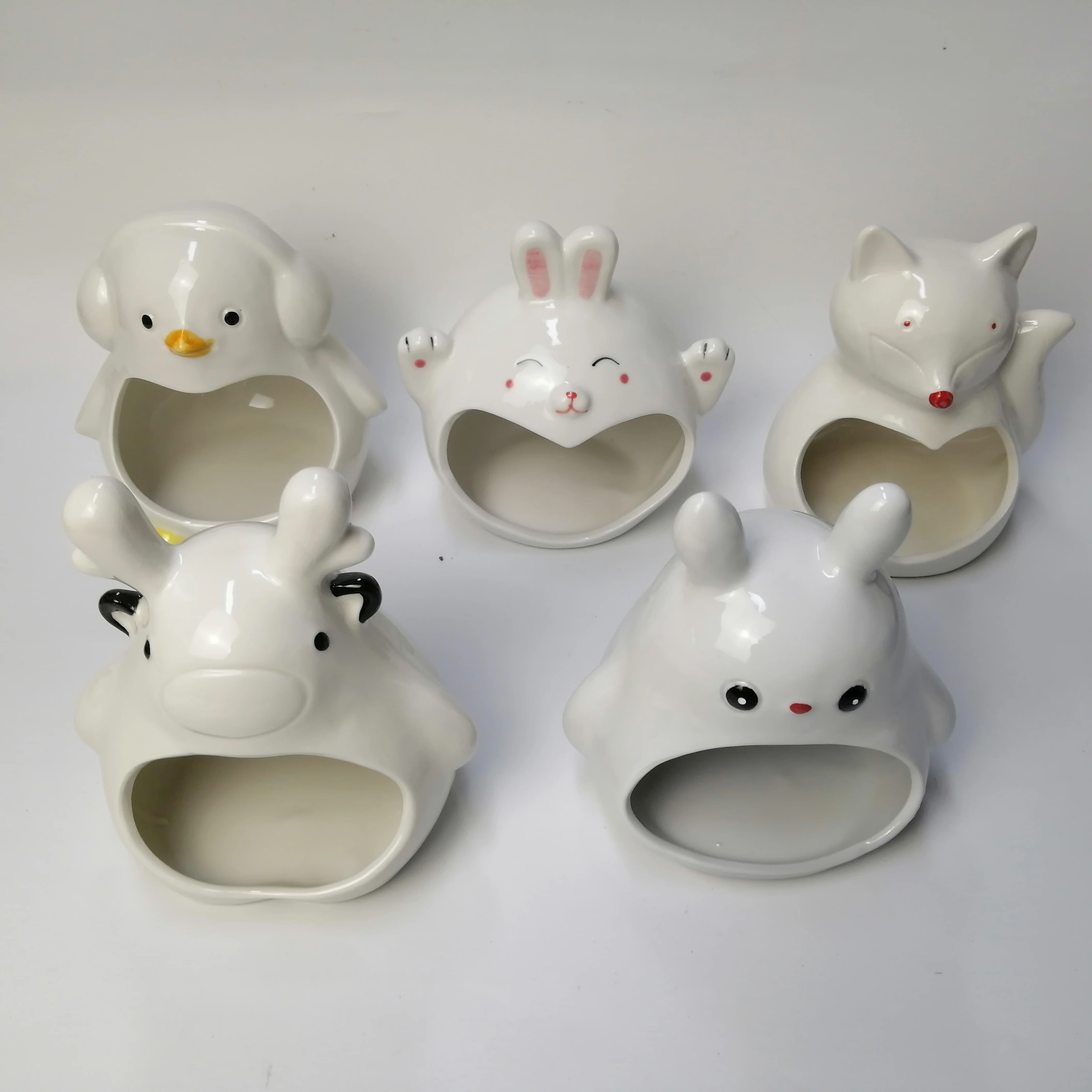 Popular In Summer Bulk Hamster Ceramic Nest Rabbit fox cow Cat Shapes Ceramic Hamster House pet cages for Sale