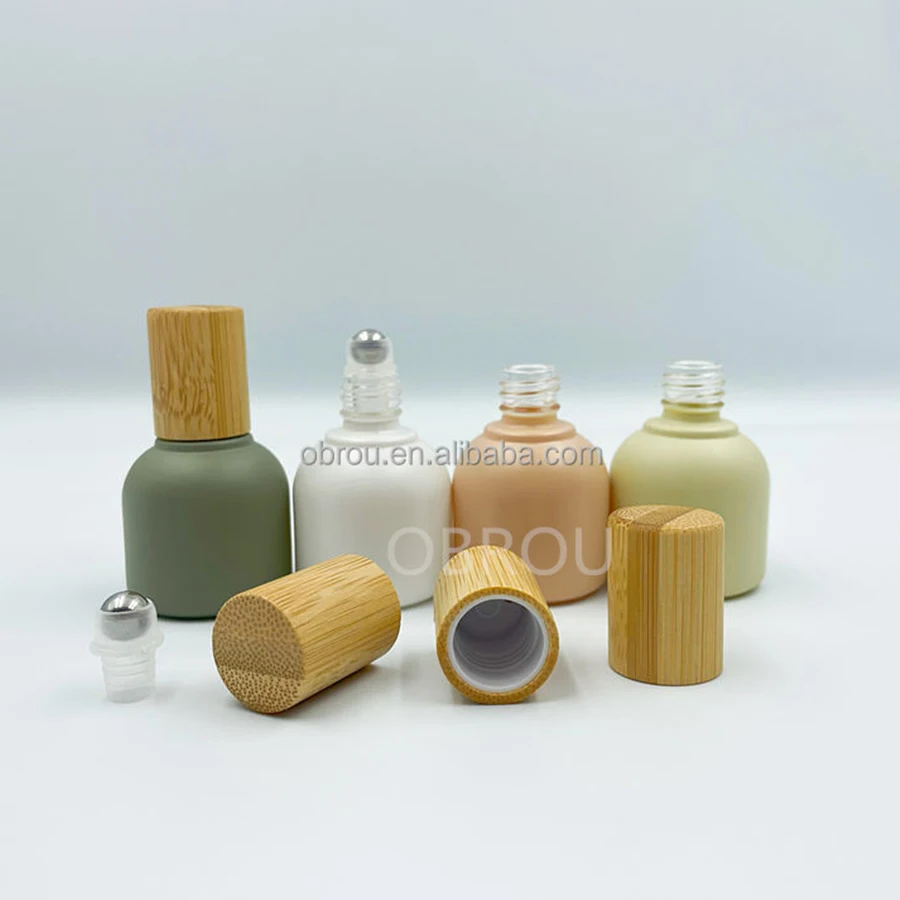 Luxury bamboo cap type 10 ml essential oil roller pink bottle perfume oil roller bottle roll on bottles 10ml