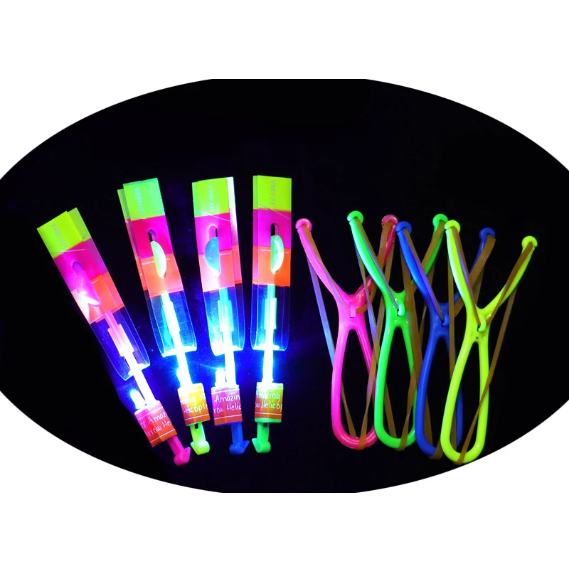 Wholesale Glow In The Dark Led Slingshot Light Bow Light Up Toy Outdoor Arrow Rocket Helicopter Flying Toy Kids Flashing Toys