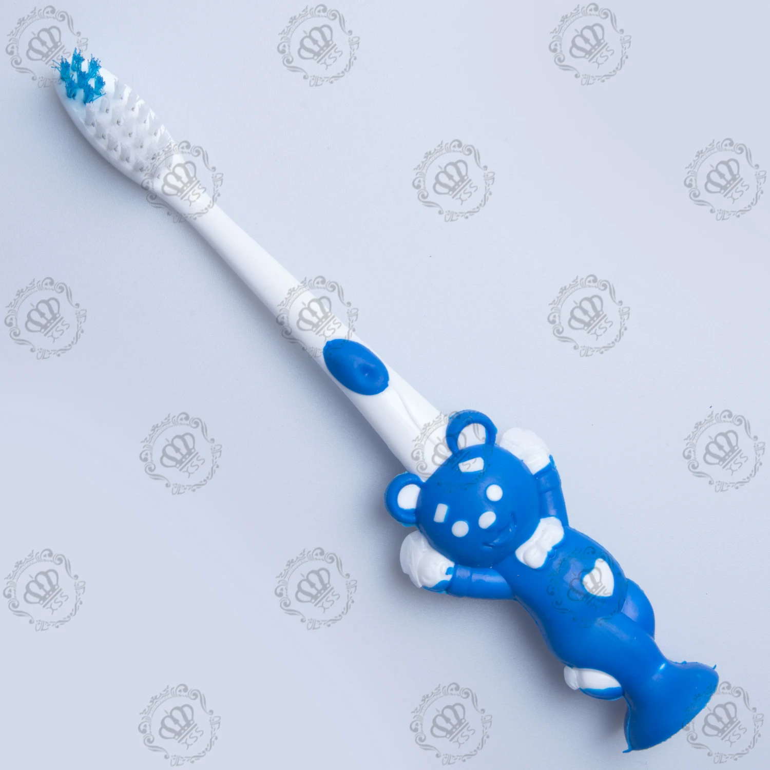 Детская зубная щетка Xibrush от производителя в форме медведя с основанием на присоске
