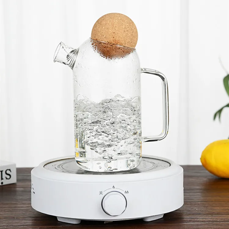 Wholesale Clear Insulated High Borosilicate Glass Carafe Pitcher With Cork Ball Lid and Handle for Water Tea Beverage