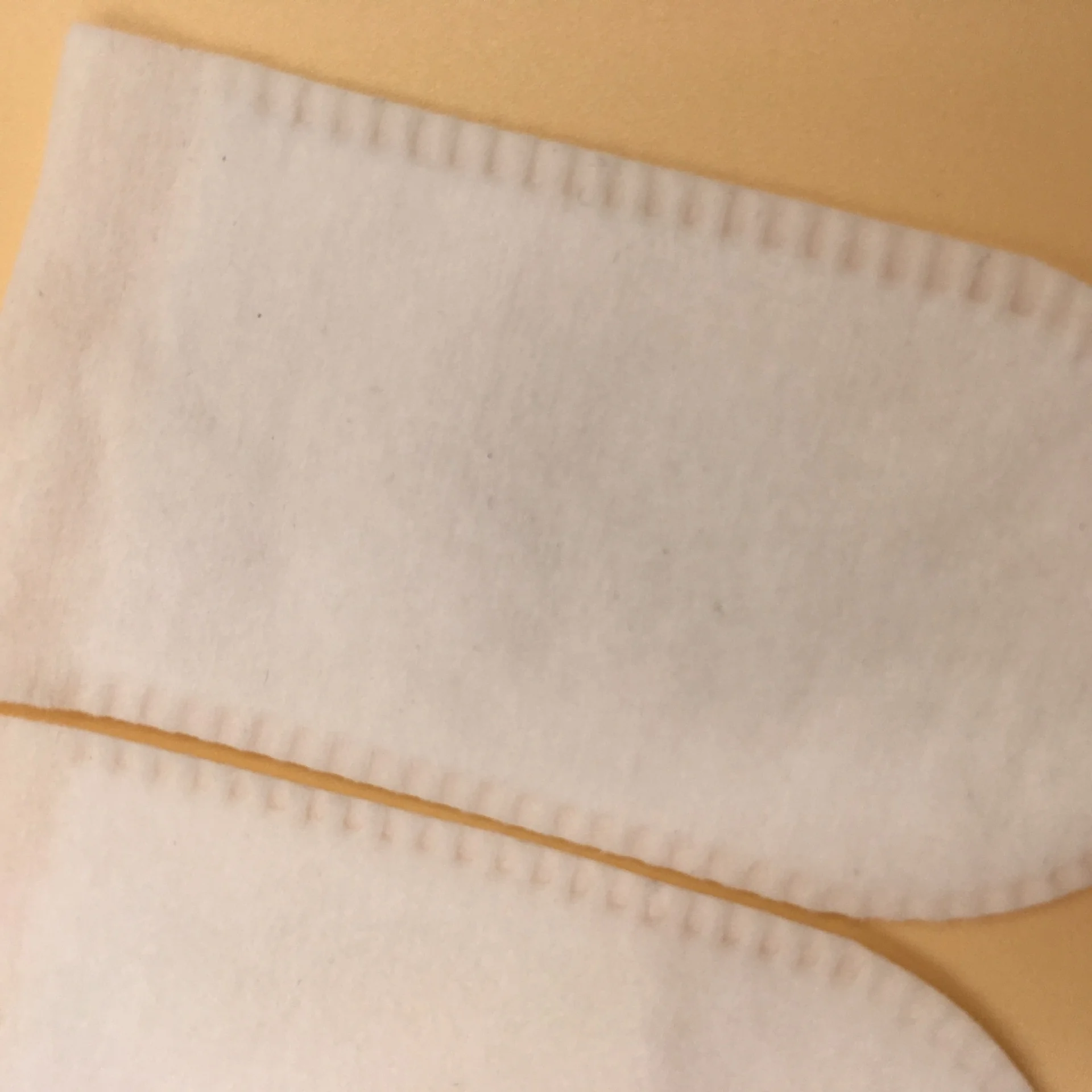 OEM Disposable non woven single finger sleeve can be used for baby or pet oral cleansing and facial makeup removal