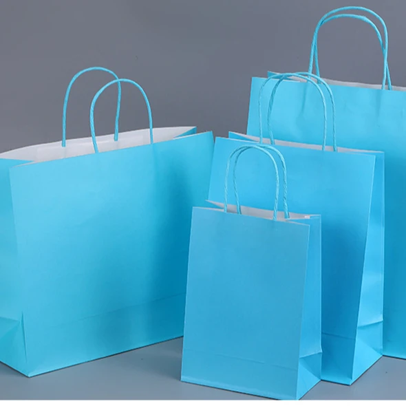 Wholesale cheap boutique reusable kraft paper bag with handle