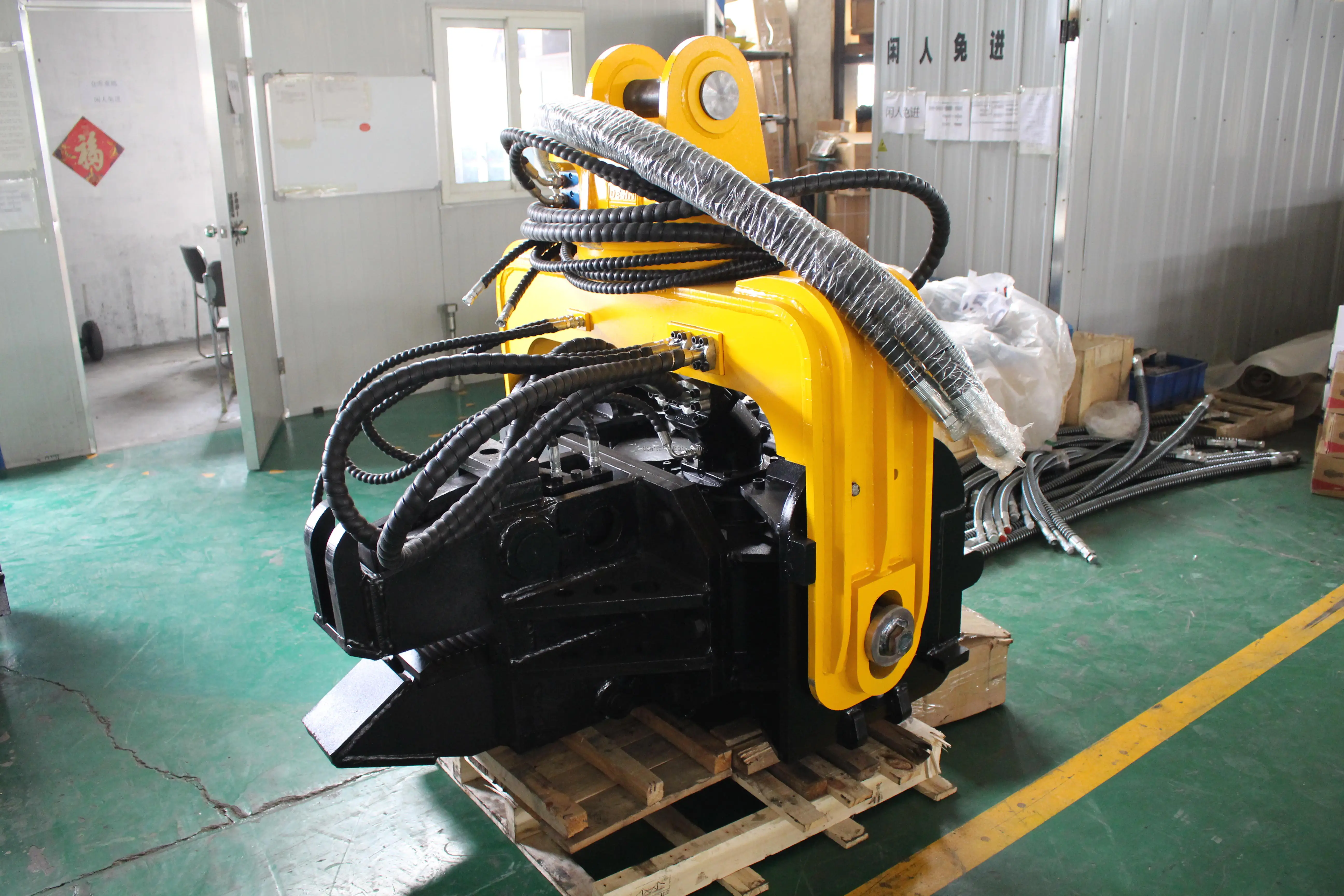 Mini excavator heavy duty vibratory hammer using pile driver hydraulics