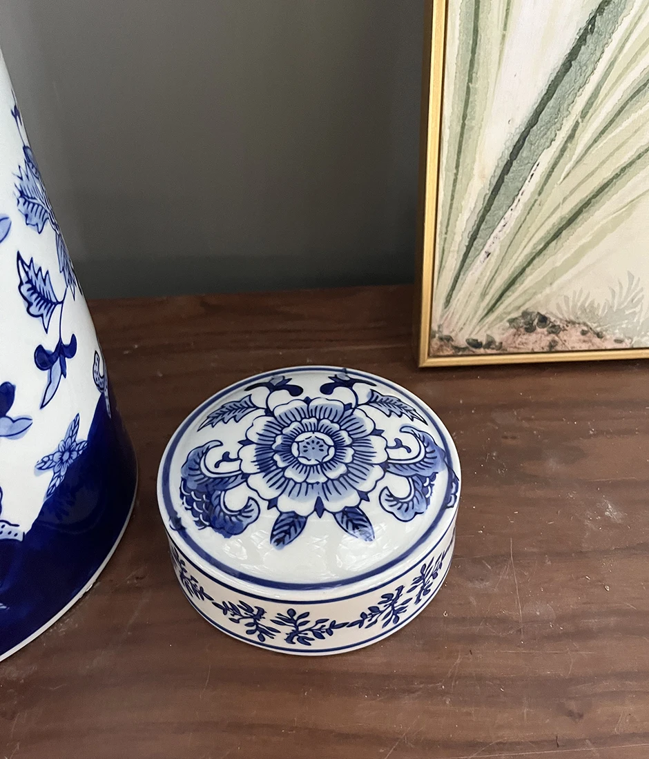 Porcelain Ginger Jar with Blue and White Peony Design A Dutch Delft blue and white baluster vase and cover