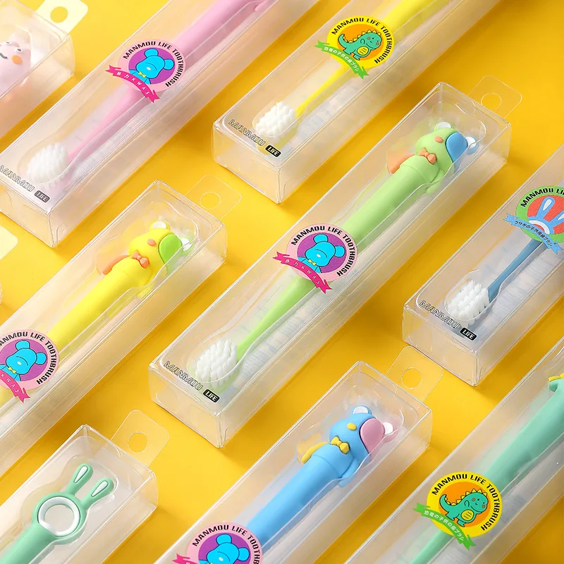 Wholesale Cute shape silicone BPA free crystal box cartoon dinosaur 0.12mm PBT soft bristles motel hotel kids child toothbrush