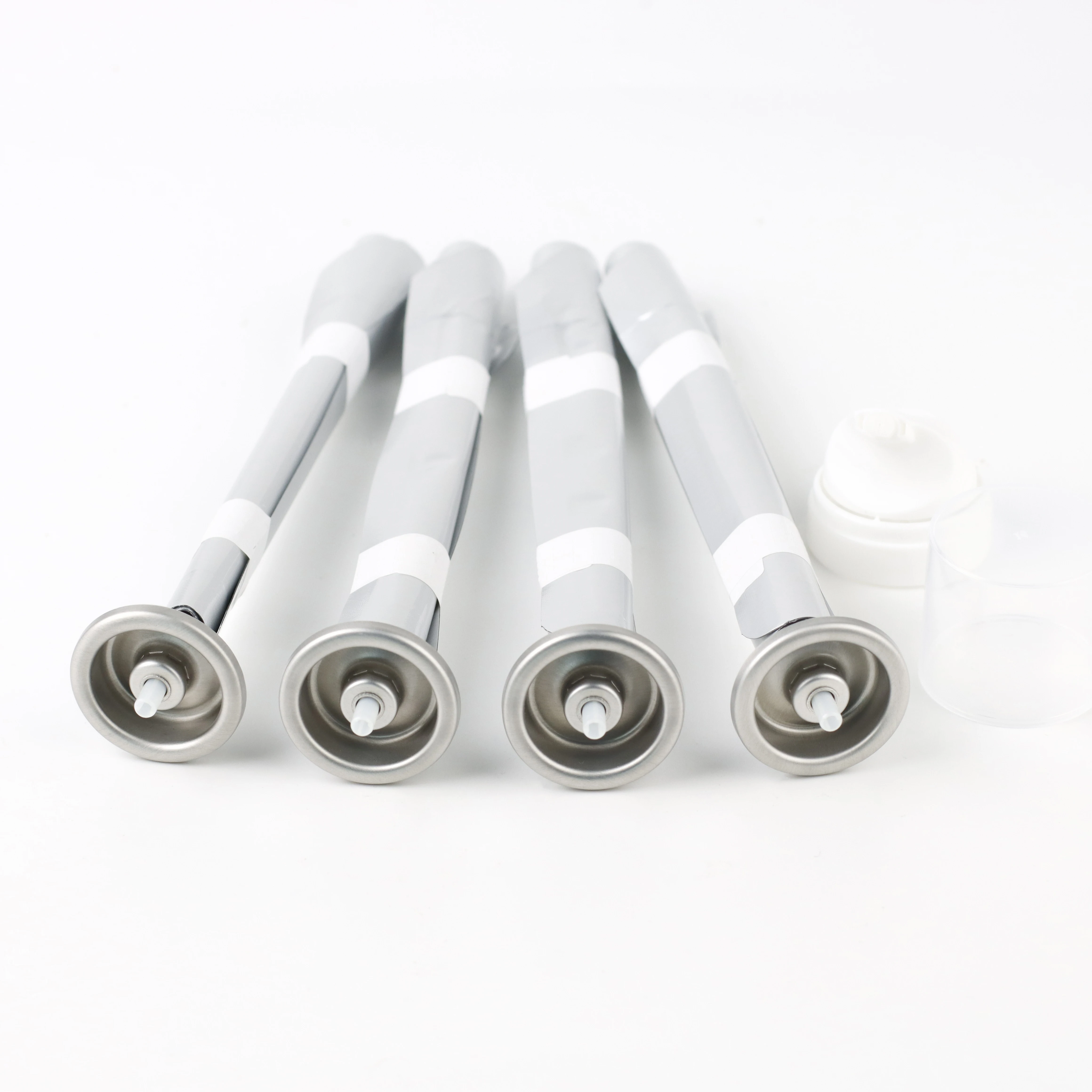 Aluminum oil can filling with pure olive oil used for cooking with olive sprayer