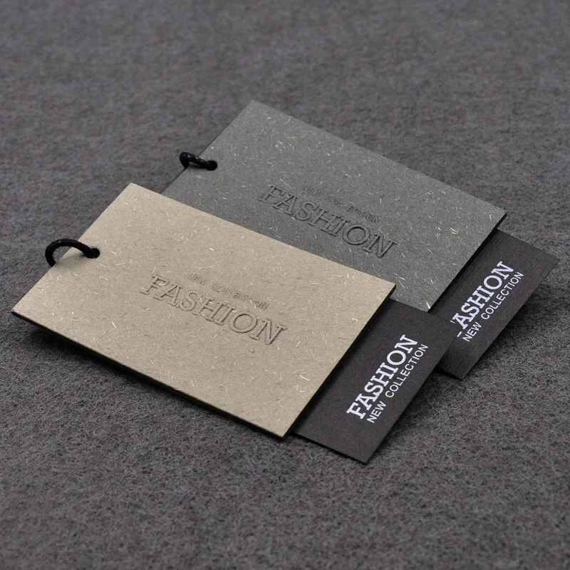 Kraft paper specially  printing embossed foiled customized with UV garments hang tag paper tag for jeans clothing and garments