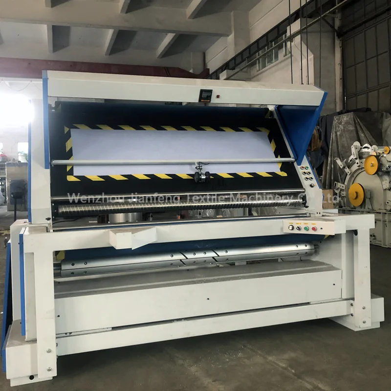Textile fabric rewinding inspection machine