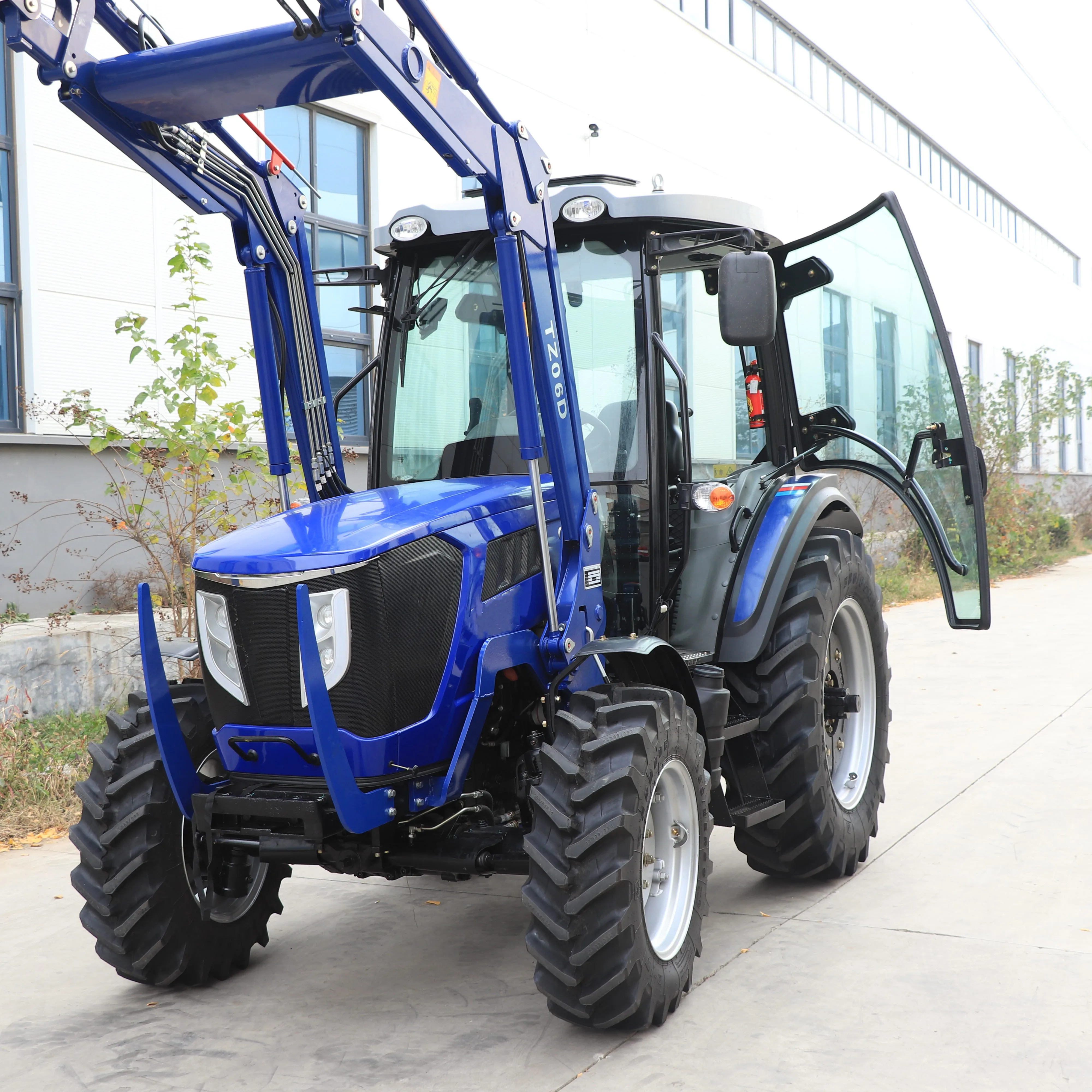 Factory cheap 50hp EURO 3 farm tractors  in georgia for agriculture 4wd tractores agricolas preci with front 4 in 1 bucket