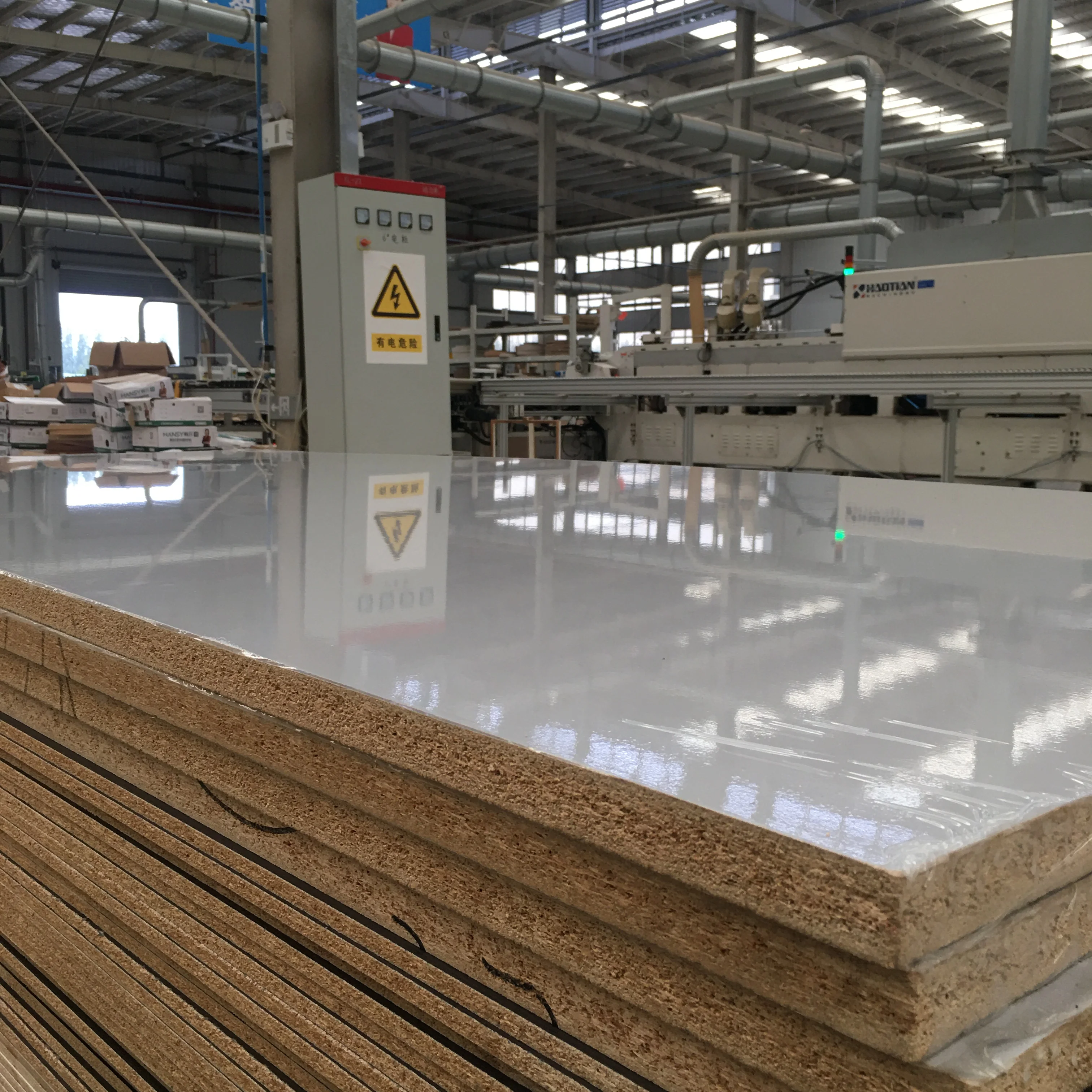 Sales E1 level 1220mmx2440mm  melamine faced high glossy uv mdf particle board