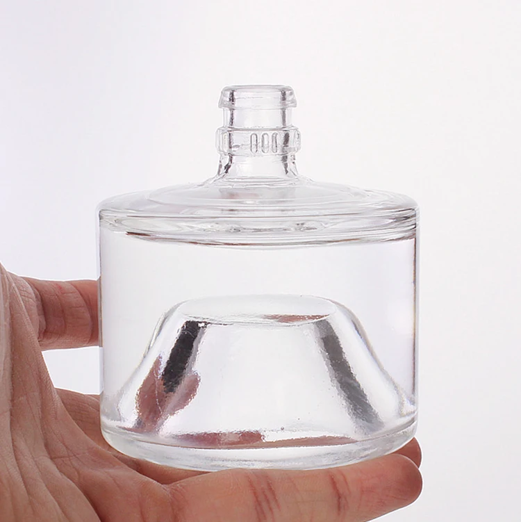 Wholesale 100ml Unique Shape Small Coffee Juice Beverage Liquor Empty Wine Glass Bottle with Lid