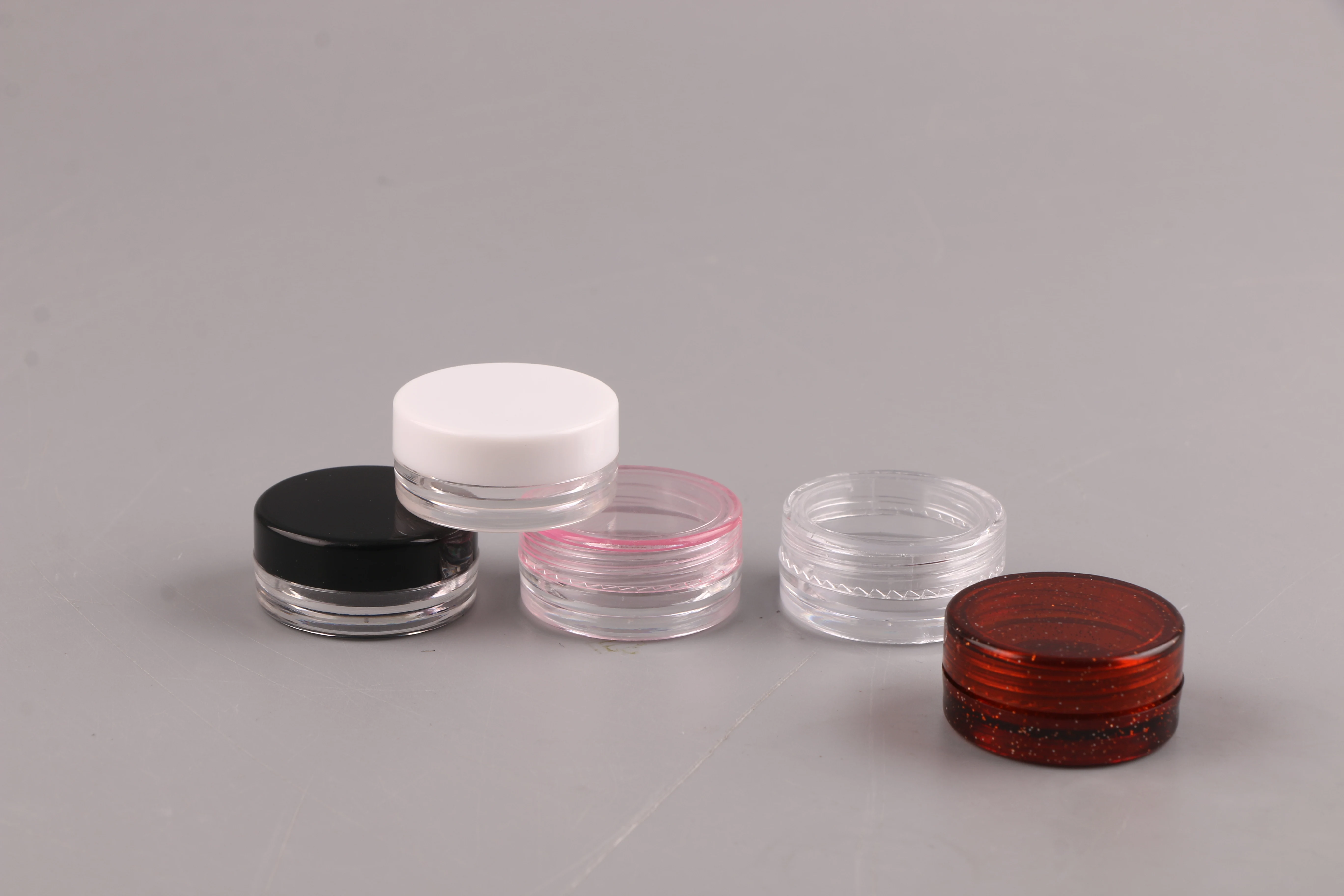 
Wholesale cheap round 3 ml PS plastic empty cosmetic packing cosmetic bottles cream jars 