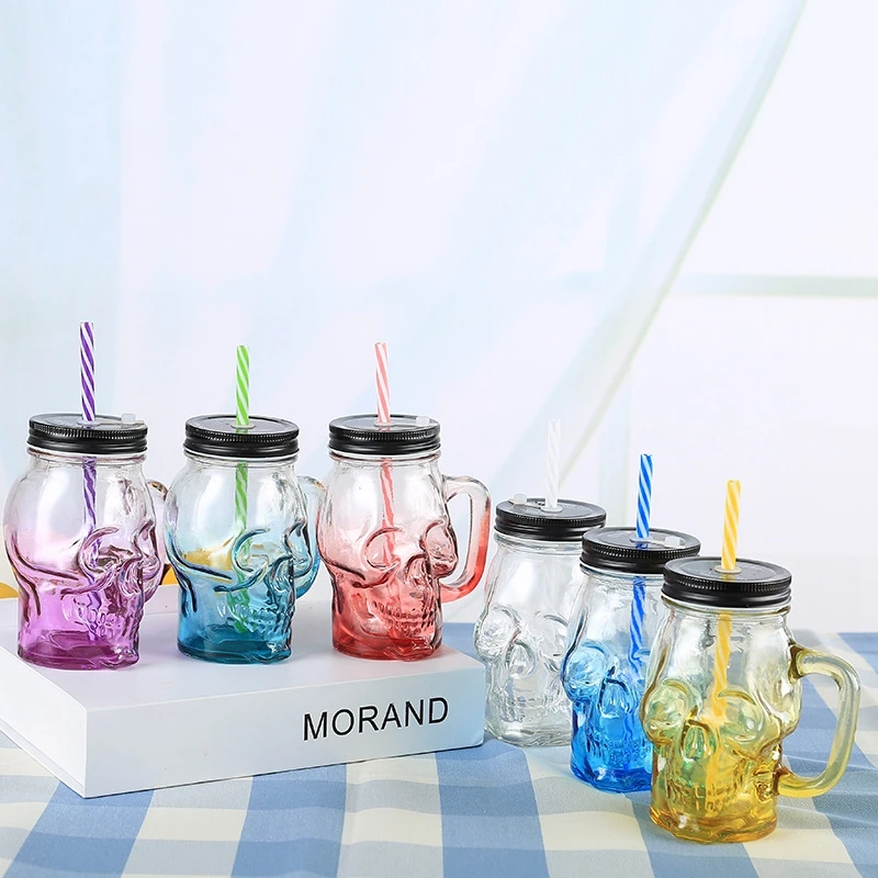 Custom Color Food Grade Skull Shape Wide Mouth Glass Mason Jar with Lids Straw Handle for Beverage Juice Container