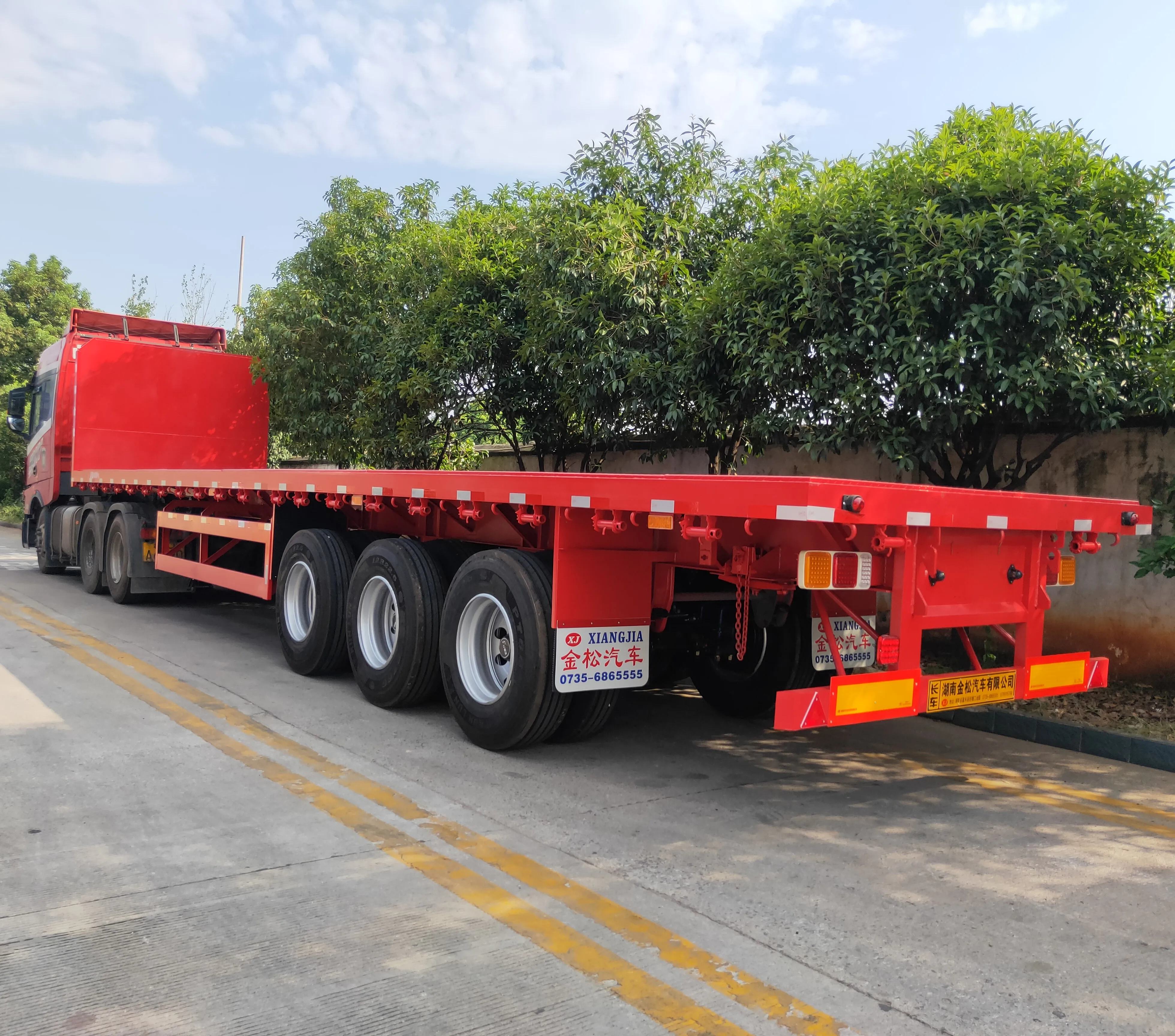 3 Axle 40 Ft 20 Ft Container Semi Trailer Chassis Flatbed Trailer For Sale