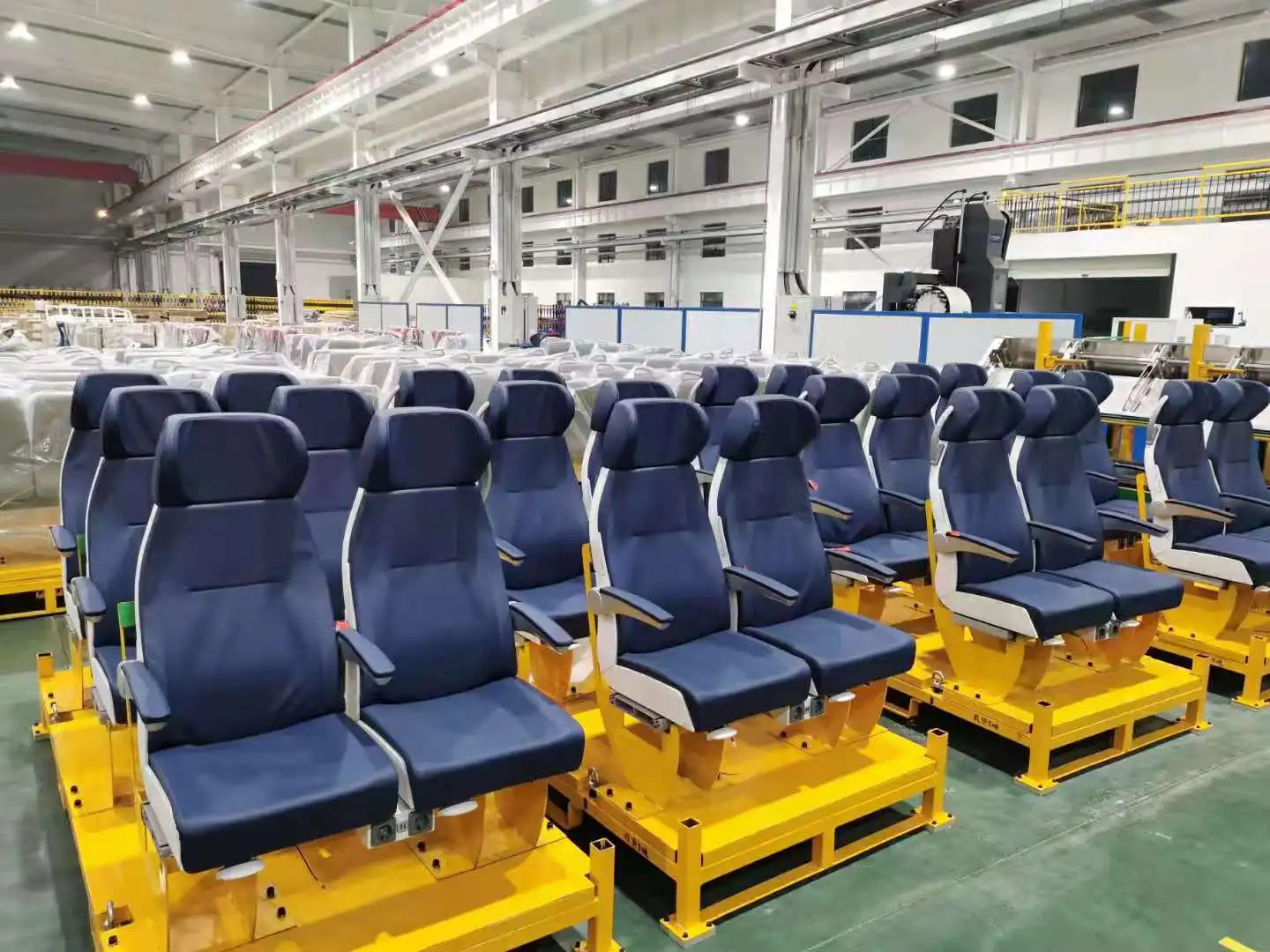Economic class railway train seats / triple
