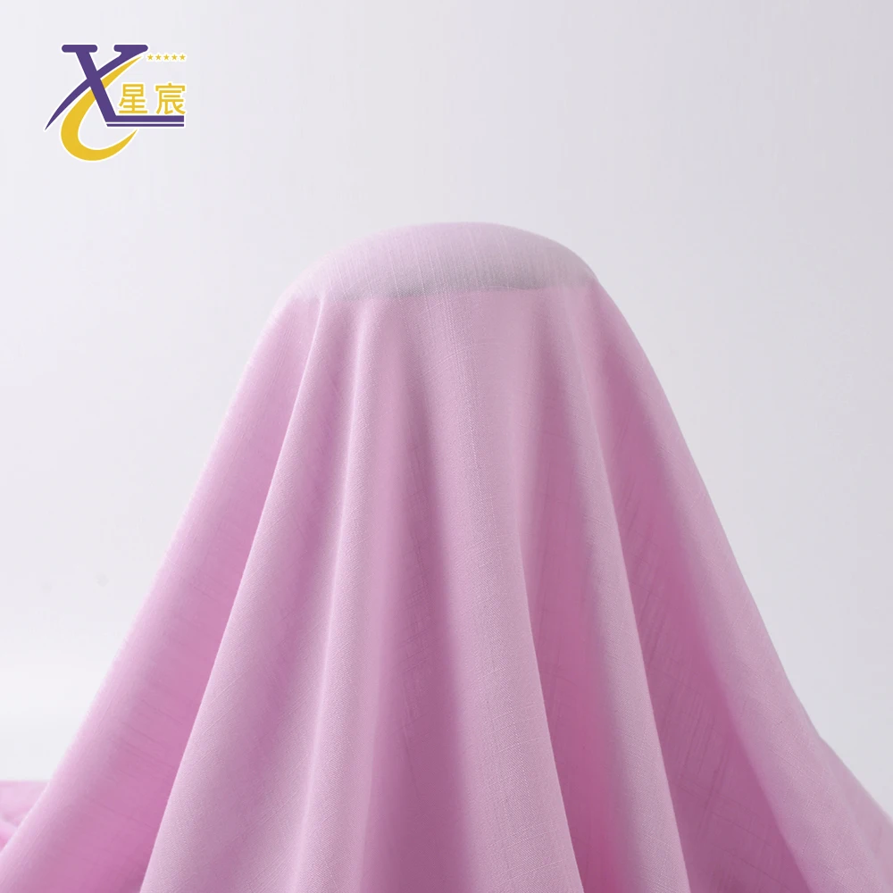 Affordable customized color 100% rayon sweater slubbed stock woven fabric for dress