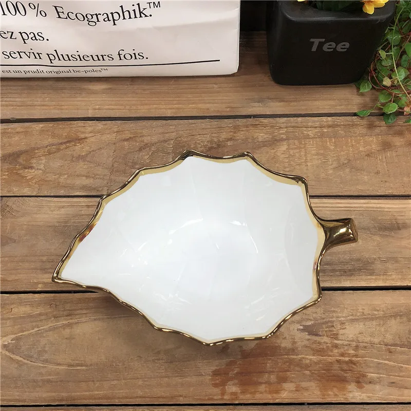 factory custom design leaf shape ceramic bowls with electroplate gold rim decoration for sale