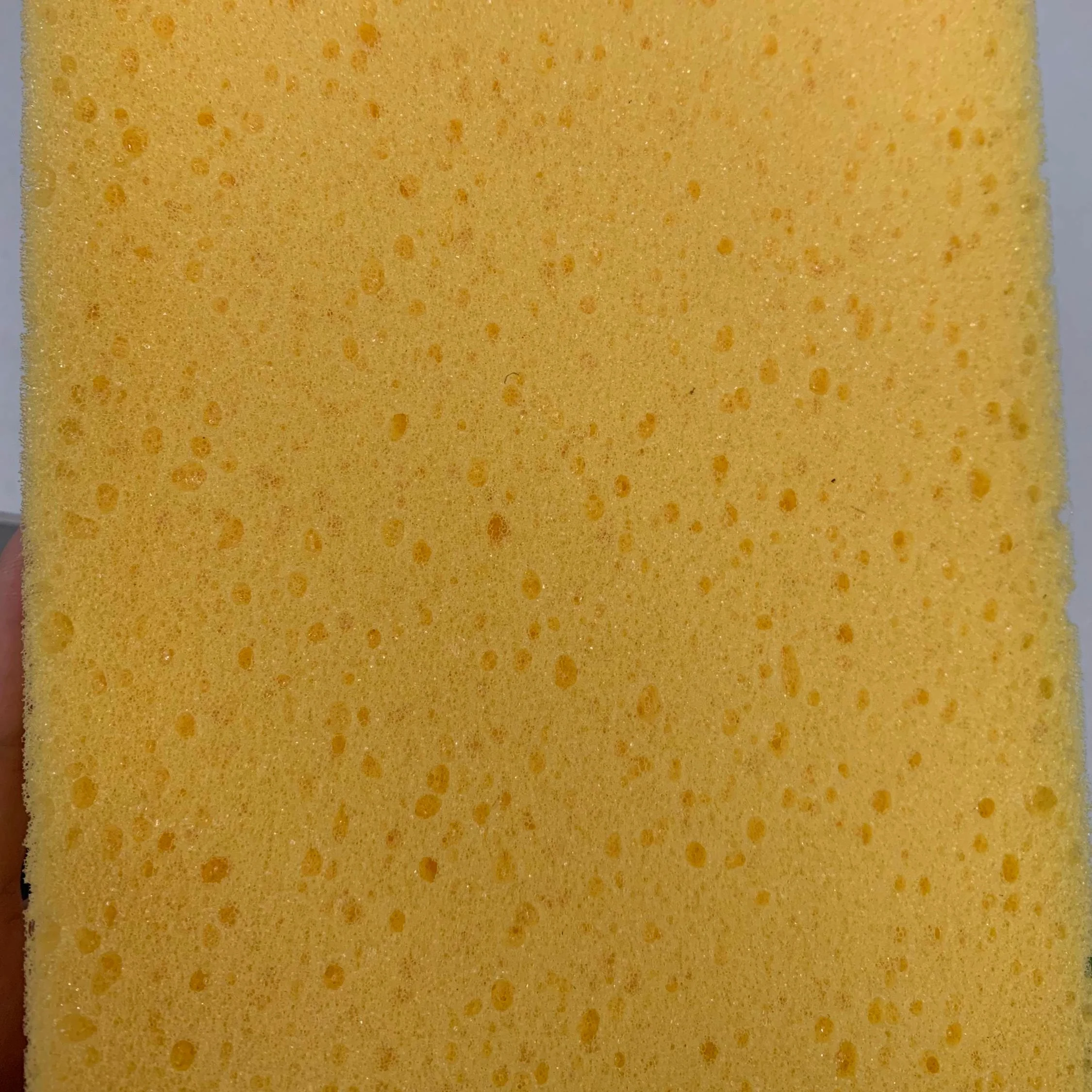 yellow open cell sponge with plastic white color handle foam trowel